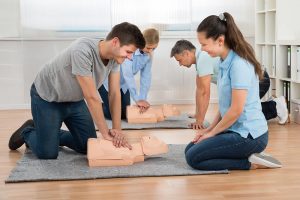 Why do companies need to consider getting first aid training for employees